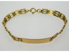 A 9ct gold identity bracelet, 7in long, 7.7g