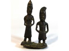 A 19thC. tribal art Benin bronze figure group, dug