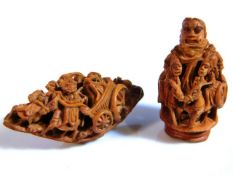 Two antique Chinese carved nuts & one uncarved, no