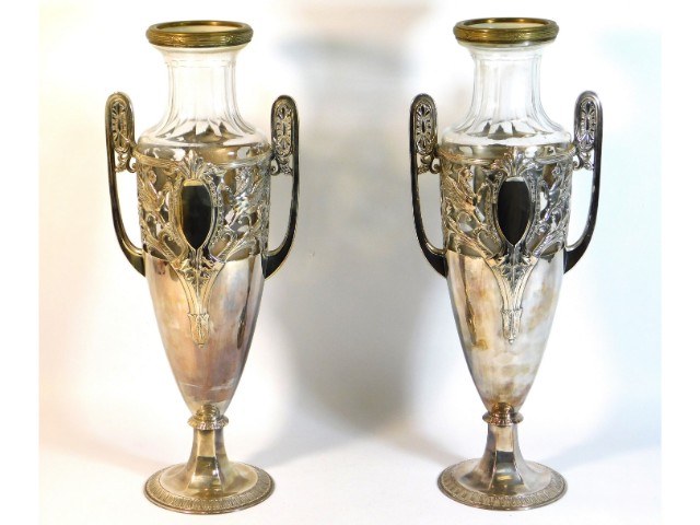A pair of WMF style silver plated vases with glass