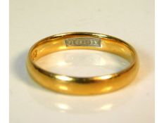 A 22ct gold band, impressed FIDELITY inside, 3.1g,