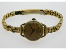 A ladies Nora 9ct gold cased wrist watch with plat