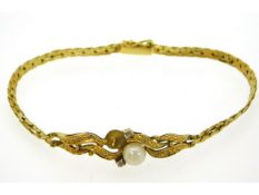 A yellow metal bracelet, electronically tests as 18ct gold, possibly Mappin & Webb, set with diamond