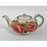 A Wemyss cabbage rose pottery teapot, restoration