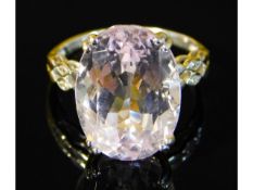 A 10ct gold kunzite & diamond ring, stone 16mm x 12mm, 5.6g, size O