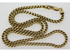 A 9ct gold 19in long square curb link necklace,