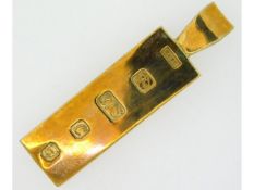 A 9ct gold ingot, 65mm x 17mm x 6mm, 63.3g