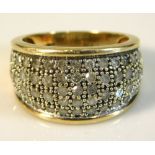 A 9ct gold ring set with 1ct of small diamonds, 4.