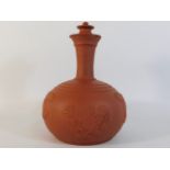 An antique Chinese style terracotta bottle vase wi