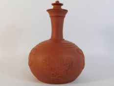 An antique Chinese style terracotta bottle vase wi