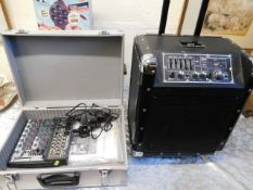 A mobile amplifier & Behringer mixer deck