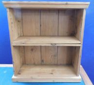 A low level pine book case, 28in wide x 30.25in hi