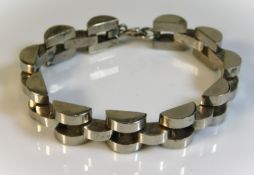 A white metal gents bracelet, tests as silver, 63.