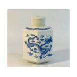 A Chinese hexagonal porcelain caddy with cover wit