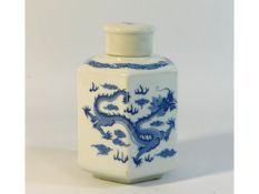 A Chinese hexagonal porcelain caddy with cover wit