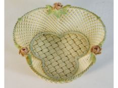 A Belleek woven porcelain basket with roses, one p