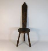 A carved spinning chair, 36in high