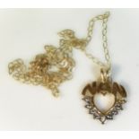 A 9ct gold necklace & "Nan" pendant set with small