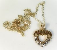 A 9ct gold necklace & "Nan" pendant set with small