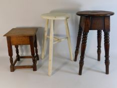 An oak stool twinned with a painted stool & a smal