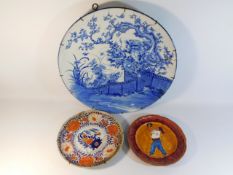 A large 19thC. Chinese blue & white charger, nine