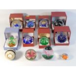 Eight boxed "Royal Crest" paperweights twinned wit