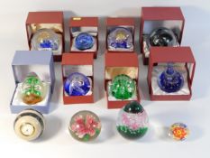 Eight boxed "Royal Crest" paperweights twinned wit