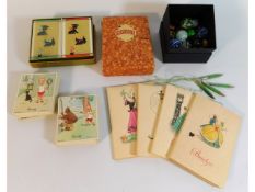 A cased set of bridge scorecards, Henry cards, a s