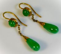 A pair of yellow metal mounted jade drop earrings,