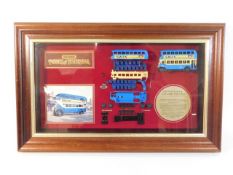 A framed Matchbox presentation of two Leyland Tita