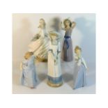 Two Lladro porcelain figures twinned with three Na