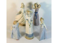 Two Lladro porcelain figures twinned with three Na