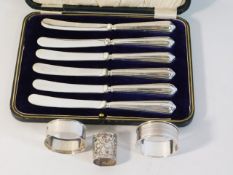 A cased set of silver handled fruit knives twinned