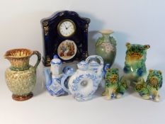 A continental style porcelain clock twinned with decorative Oriental ceramics & other items