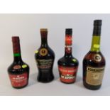 A bottle of Martell cognac brandy twinned with two
