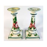 A pair of Wemyss cabbage rose candle holders retai