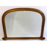 A gilt coloured over mantle mirror, 46in x 33in
