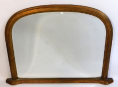 A gilt coloured over mantle mirror, 46in x 33in