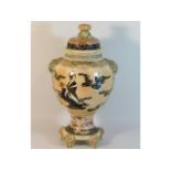 A Japanese earthenware lidded vase, 16.375in tall
