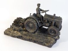 A detailed resin type model of farmer with dog & t