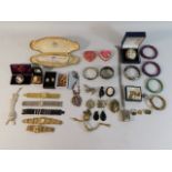 A quantity of costume jewellery including a coin b