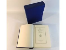 A Folio Society edition of The Qur'an with sleeve