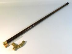 A gents three piece walking cane with brass handle