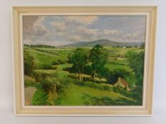 A landscape oil painting by W. Lambert Bell (Briti