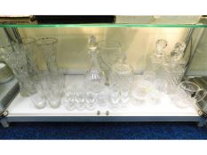 Four cut glass decanters, a selection of drinking