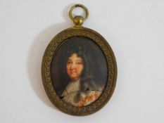 A 19thC. gilt bronze mounted porcelain portrait pl