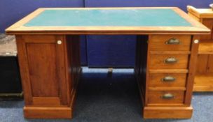 An MOD style pedestal desk, later leather style co