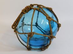 A large antique blue glass float approx. 9.5in diameter