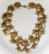 An ornate, silver gilt filigree work necklace, 101