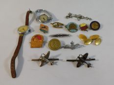 Two silver spitfire brooches, an RAF sweetheart badge, a Winnie The Pooh badge & other items